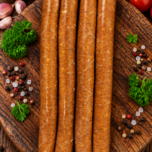Rustic Sausages on a Wooden Board Kip merguezworstjes